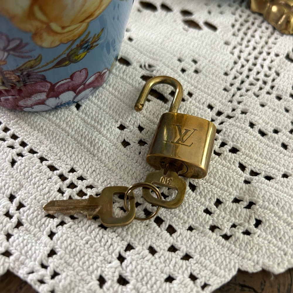 Louis Vuitton Authentic Brass Lock and 2 keys.